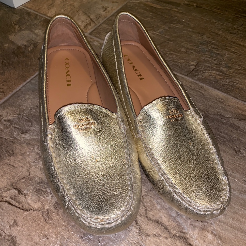 Authentic Coach loafers in gold